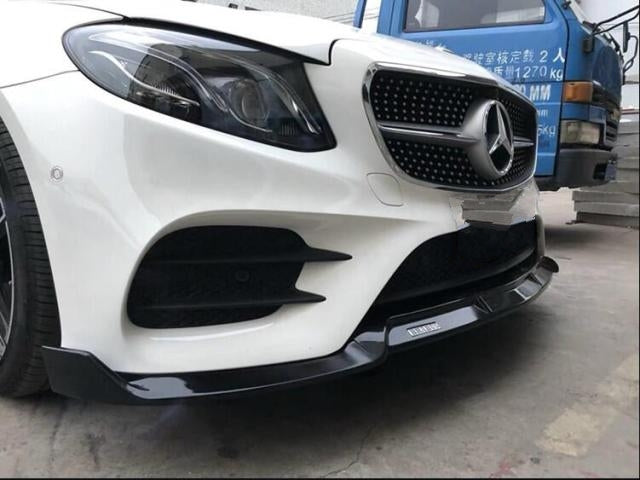 Facelift Mercedes C-Class/C43 AMG Line (A205/C205/W205) Saloon, Coupe and Convertible BRABUS Style Carbon Fibre Front Lip Spoiler - Manufactured in the BRABUS styling for the C-Class/C43 AMG Line Models. This product is the perfect addition to your facelift C-Class Model. Its stunning finish will add unique styling to your C-Class Model. For Models between 19-21.