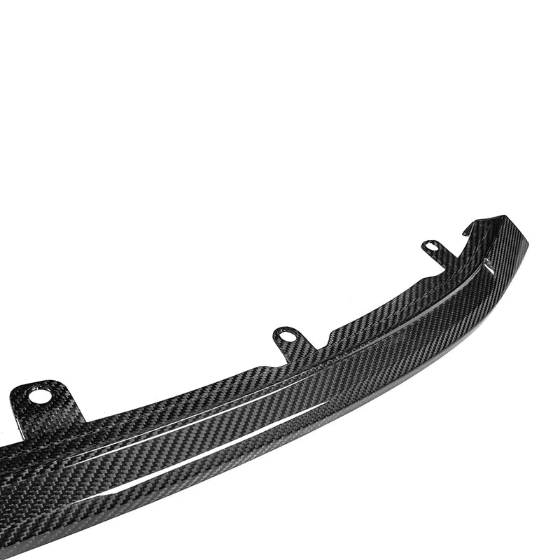 BMW G80/G82/G83 M3/M4 CSL Style Carbon Fibre Front Lip Spoiler - Manufactured from 100% PRE-PREG Carbon Fibre to be a perfect fit for the G80/G82 M3/M4 Models. Taking inspiration from the masters of performance parts CSL with this front lip spoiler, you will be able to add a unique touch to your new BMW G80/G82 M3/M4. 