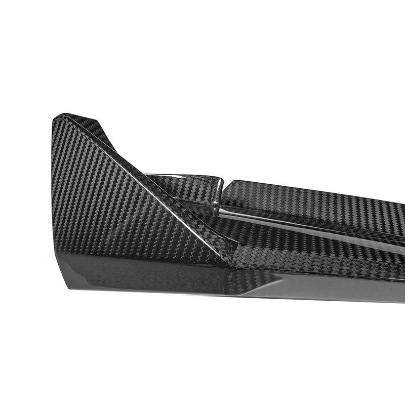 BMW G80/G82/G83 M3/M4 CSL Style Carbon Fibre Front Lip Spoiler - Manufactured from 100% PRE-PREG Carbon Fibre to be a perfect fit for the G80/G82 M3/M4 Models. Taking inspiration from the masters of performance parts CSL with this front lip spoiler, you will be able to add a unique touch to your new BMW G80/G82 M3/M4. 