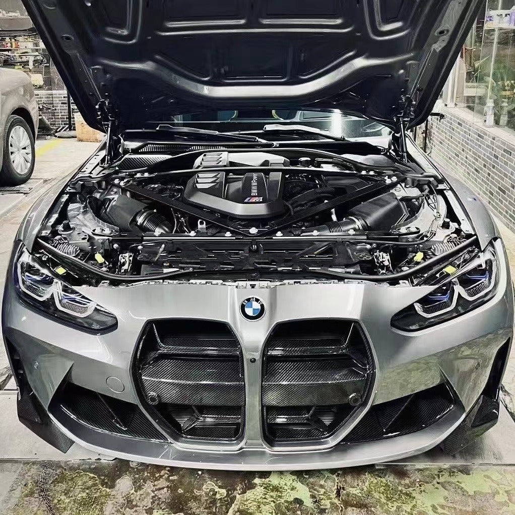 BMW G80/G82/G83 M3/M4 CSL Style Carbon Fibre Replacement Dry Carbon Front Grille  - Manufactured from 100% Carbon Fibre to be a perfect fit for the G80/G82/G83 M3/M4 Models. Taking inspiration from the BMW CSL Styling. transform the entire front end of your G80/G82/G83 M3/M4 BMW with this complete replacement front Grille. For both the ACC and Non ACC Models.