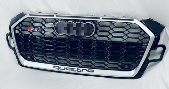 The Facelift B9.5 Audi A5/S5 Gloss Black and Satin Silver RS5 Style Front Grille are manufactured on the new facelift B9.5 A5/S5 Models taking design inspiration from the RS5 Styling with the honeycomb front grille this product is a stunning part to add to your 2021 Audi A5/S5 Model. This product comes without any logos and is a direct replacement product.