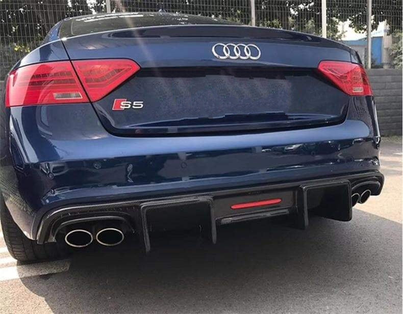 Audi A5/S5 Karbel Style Carbon Fibre Rear Bumper Diffuser - Inspired by Karbels design with the incorporated centre LED racing brake light for added flair. We think this is the most aggressive rear diffuser you can fit into your Audi A5/S5 B8.5 Model. Manufactured from Real Carbon fibre and FRP to give it a structure that will stand the test of time and speed.  