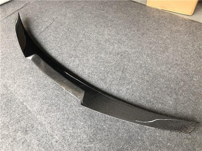 The Audi A5/S5 B8 and B8.5 S Line M4 Inspired Carbon Fibre Rear Trunk Spoiler - Manufactured from Pre-Preg Carbon Fibre. This Audi A5 Rear Spoiler fits the 2 Door Coupe models along with the Audi S5 Models to enhance the rear end with an M4 Inspired Rear Trunk Spoiler for the Audi S5 Coupe models. 