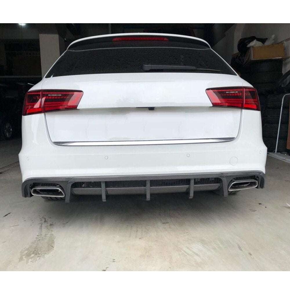 Audi A6/S6 Estate Carbon Fibre Rear Bumper Diffuser - Manufactured to be aesthetically and aerodynamically enhanced over the OEM Diffuser with its 5 Diffuser fin design, this part is uniquely specific to the Audi A6/S56 Estate Models. Manufactured from real carbon fibre and FRP to stand the test of time and be a fit and forget product. 