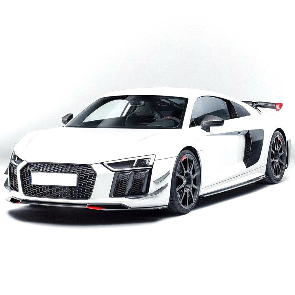 AUDI R8 V10 Carbon Fibre Front Bumper Canards - Styled from the stunning design of the Audi R8's front bumper, this product is a must-have if you're looking to add a touch of flair to your Audi R8. You know what they say. The devils in detail and these 100% Carbon fibre front canards have the detail you are looking for. 
