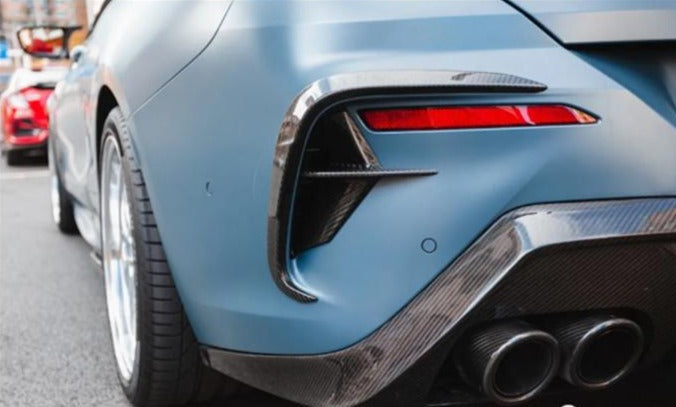 BMW 8 Series and M8 Series Carbon Fibre Rear Bumper Canards - Manufactured from 100% Pure carbon fibre to not only be Durable but also lightweight. providing the 8 Series and M8 Models with a more aesthetically pleasing rear bumper while also having the benefits of better aerodynamics. 
