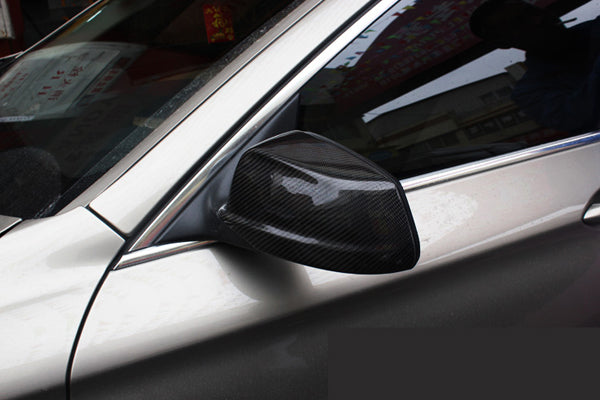 BMW F10 5 Series Pre-facelift Carbon Fibre Replacement Mirror Covers - Manufactured to be a perfect direct replacement for the 5 Series BMW Models from Saloon/Estate and Long Wheel Based Versions. This product is manufactured from Real Carbon Fibre and ABS Plastic and is also coated with a UV Resistant coating to ensure your carbon mirror covers are perfect for years to come. 