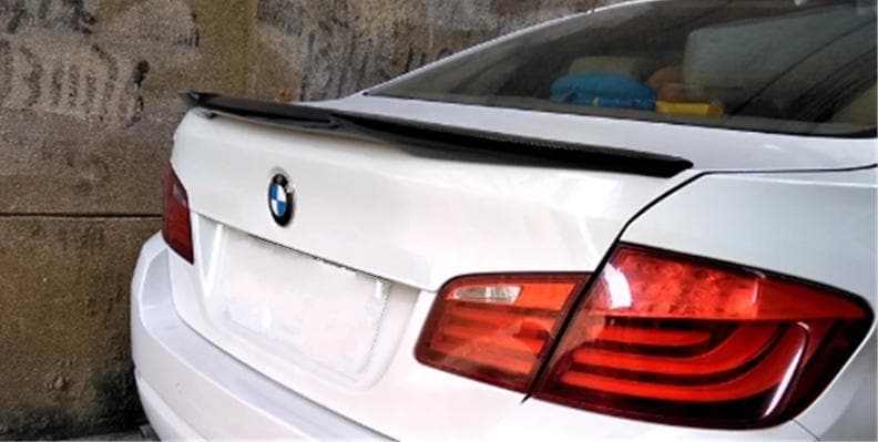 BMW F10 5 Series and M5 V Design Style Carbon Fibre Rear Lip spoiler. For the F10 5 Series and M5 Models between 2010 and 2017. This V Spoiler is manufactured from 100% Carbon Fibre, making this product seriously strong and light to increase downforce with minimal weight increase to your 5 Series BMW. Manufactured by our own factory to be a Vorsteiner Inspired product. 