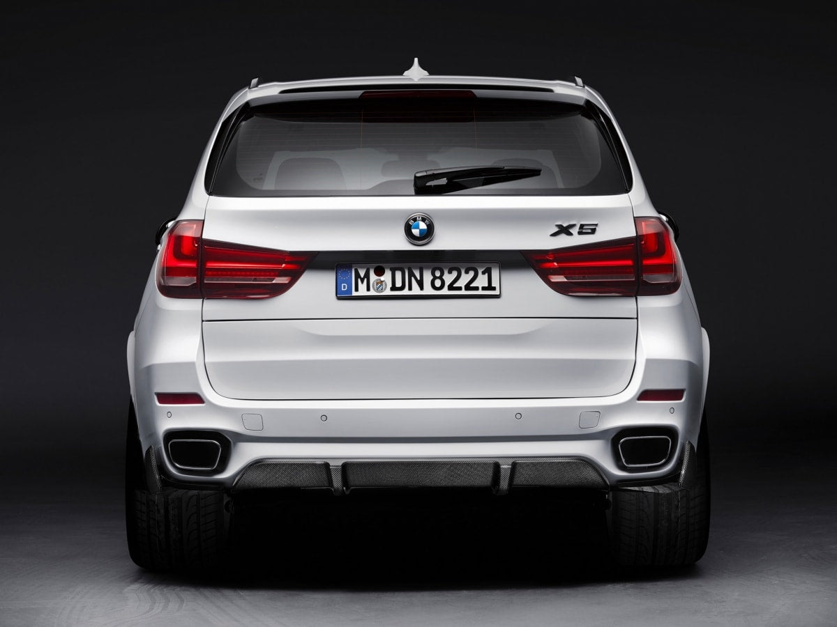 BMW X5 F15 M Performance Carbon Fibre Rear Bumper Diffuser with Carbon Fibre Rear Bumper Corner Canards - Inspired by the M Performance design Styling to perfectly match the X5's shape and dynamics. This product increases air diffusion and increases the presence of your X5 on the road. It is manufactured from 2*2 Carbon Fibre Weave and FRP to produce a robust and durable product that will last the lifetime of your vehicle. 