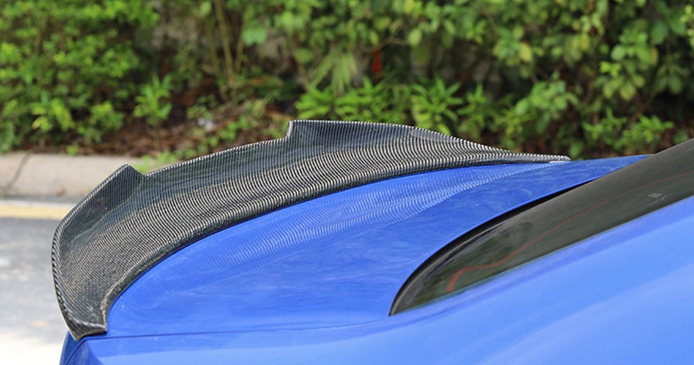 BMW F26 X4 PSM Inspired Carbon Fibre Rear Hatch Spoiler - Manufactured to be a close style that PSM created for the BMW Models, This spoiler is sure to turn heads with its large upsweep and notches, which promote more downforce while also looking fantastic. Manufactured from 2*2 Carbon Fibre Weave with FRP and finished in a UV resistant coating. 