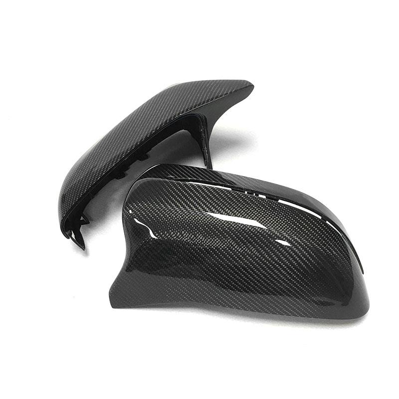 BMW 7 Series (G11/G12) M Style Carbon Fibre Replacement Mirror Covers - Manufactured from Real Carbon Fibre with an ABS Plastic base to ensure this product's fitment is perfect for your G11/G12 7 Series BMW Model. Taking inspiration from the M Styling, this product has a modified solid top point section to meet the door without impeding the mirror folding capability. 