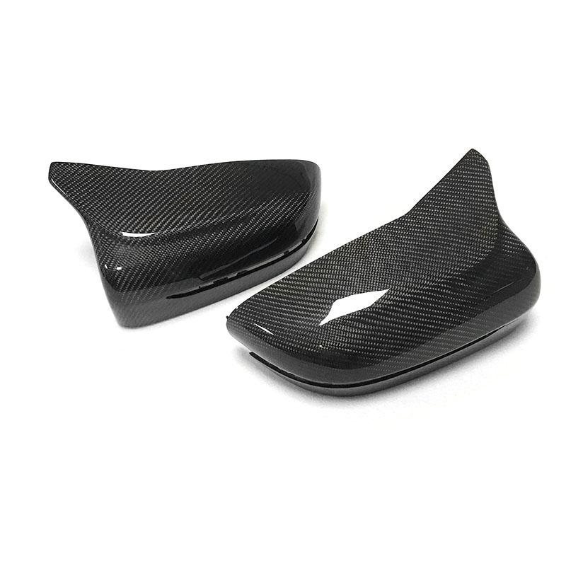 BMW 7 Series (G11/G12) M Style Carbon Fibre Replacement Mirror Covers - Manufactured from Real Carbon Fibre with an ABS Plastic base to ensure this product's fitment is perfect for your G11/G12 7 Series BMW Model. Taking inspiration from the M Styling, this product has a modified solid top point section to meet the door without impeding the mirror folding capability. 