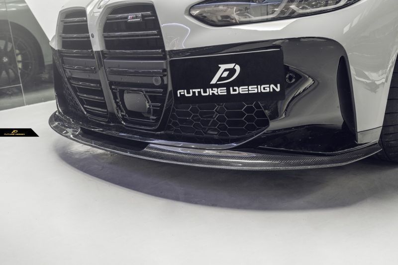 BMW G80/G82 M3/M4 Future Design Carbon Fibre Front Lip Spoiler - Manufactured from 100% Carbon Fibre to be a perfect fit for the G80/G82 M3/M4 Models. Taking inspiration from the masters of Aftermarket parts from Japan. you will be able to add a unique touch to your new BMW G80/G82 M3/M4. 