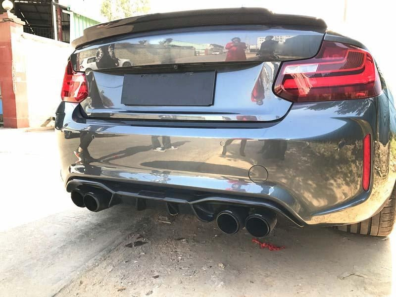 BMW M2/M2 Competition Akrapovic Inspired Carbon Fibre Rear Diffuser - Incorporating the Akrapovic design into a BMW is always a dream of most enthusiasts. We are here to help a little with our AK Style carbon fibre rear diffuser you can rock that look with style. Manufactured from 2*2 3K Twill Carbon Weave with FRP, creating a robust and durable product that will not fade with our UV Resistant Finishing Coat.