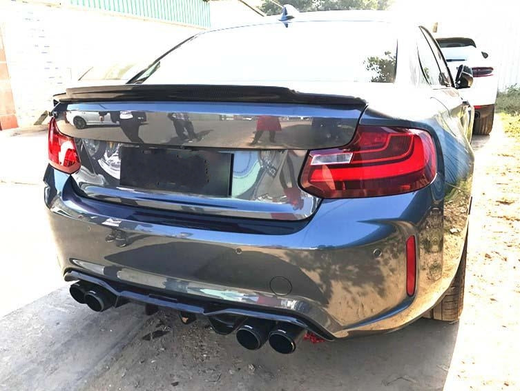 BMW M2/M2 Competition Akrapovic Inspired Carbon Fibre Rear Diffuser - Incorporating the Akrapovic design into a BMW is always a dream of most enthusiasts. We are here to help a little with our AK Style carbon fibre rear diffuser you can rock that look with style. Manufactured from 2*2 3K Twill Carbon Weave with FRP, creating a robust and durable product that will not fade with our UV Resistant Finishing Coat.