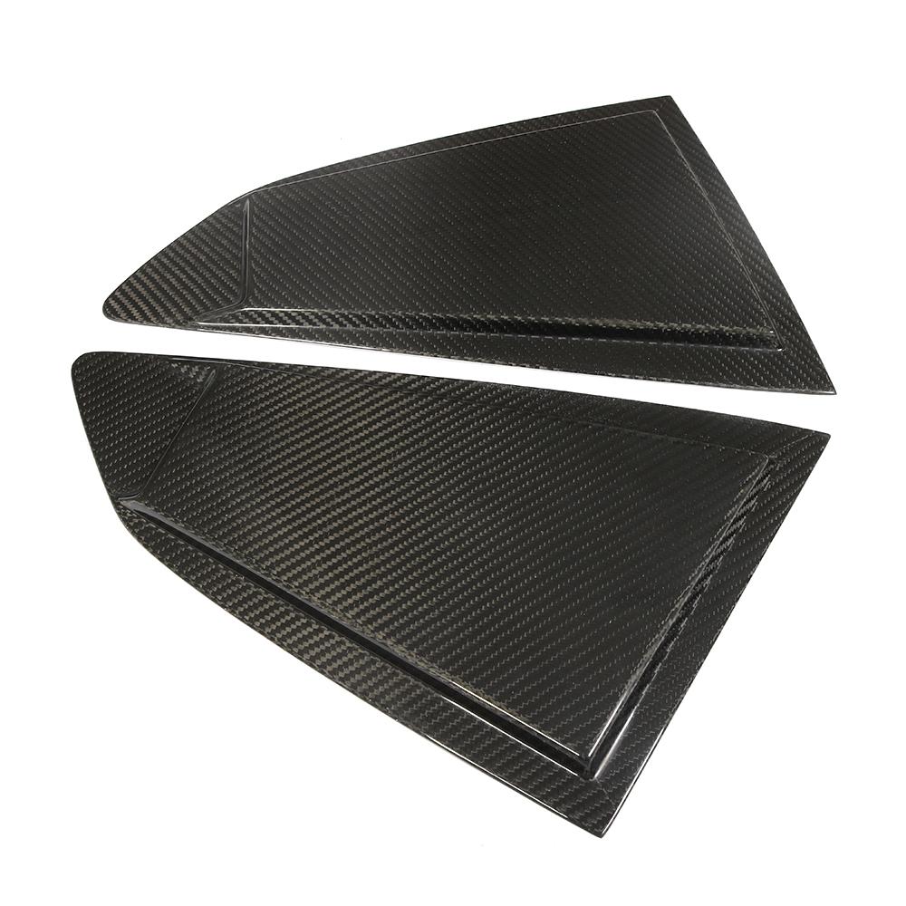 Chevrolet Camaro Carbon Fibre Rear Window Vent Trims - Inspired by the Racing style of this car, these rear window trims increase aerodynamics and increase the presence of your Camaro while on the road. Manufactured from 2*2 Carbon Fibre Weave with FRP, these Window Trims are Robust and Durable to any speed that the Camaro can achieve. 