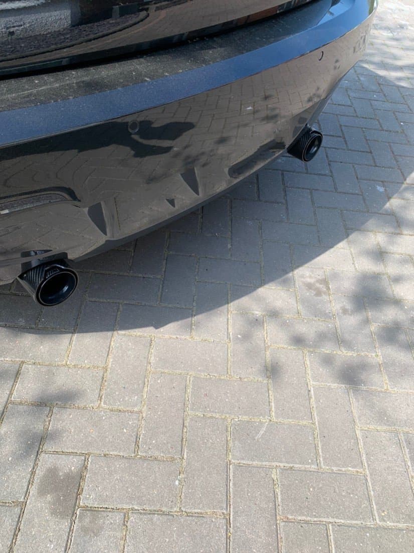 BMW M135I M140I F20 F21 Carbon Fibre M Performance Exhaust Tips painted in gloss black with Glossy Carbon Fibre Outer Shell