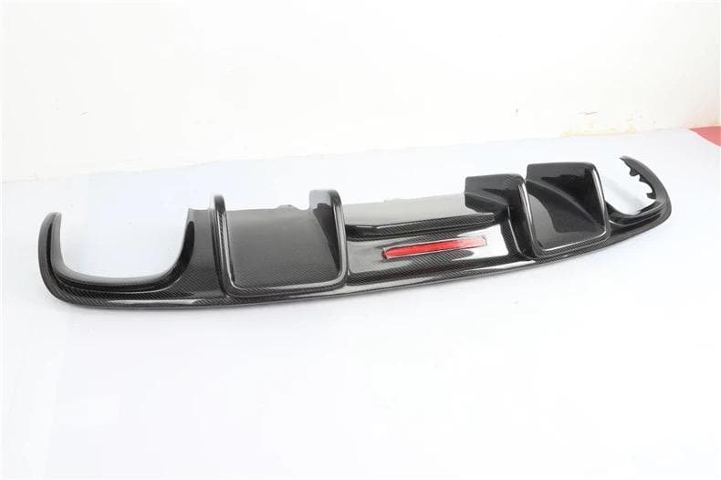 Audi B8.5 A4/S4 KB Style Carbon fibre Rear Diffuser for the A4 S Line, S4 and Non-S Line A4 Models between 2013 - 2016. This diffuser is inspired by Karbels design with the integrated LED centre rear brake light used as either a race-style brake light or a 2nd Fog light. Manufactured from Real Carbon fibre and FRP to create a strong and durable product that will last the lifetime of your Audi A4 Model. 