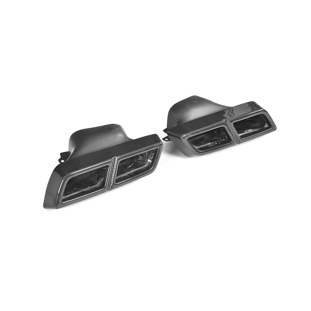 Mercedes Benz A45/C63/E63/G63 Full Carbon Fibre Exhaust Tips. Manufactured from 100% Carbon Fibre Weave and designed to replace the original exhaust tips that come on the A45 (W176) C63 (W205/C205/S205) E63 (W212) G63 (W463) Models. This product attaches directly onto the original mounting points, please note that you may be required to drill additional holes depending on where your model's mounts are. 