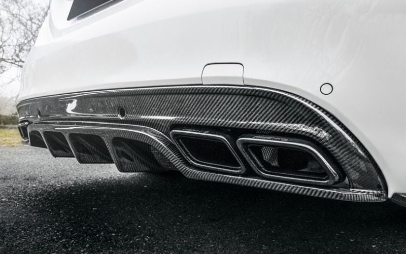 Mercedes Benz Future Design Inspired Carbon Fibre Rear Diffuser for the C Class/C43/C63 S205/W205 Saloon and Estate Models - Manufactured from 2*2 Carbon Fibre and FRP, this product is robust and durable. Inspired by the Future Design Styling to add Aggression and texture to the rear of the C-Class and C63 Models.