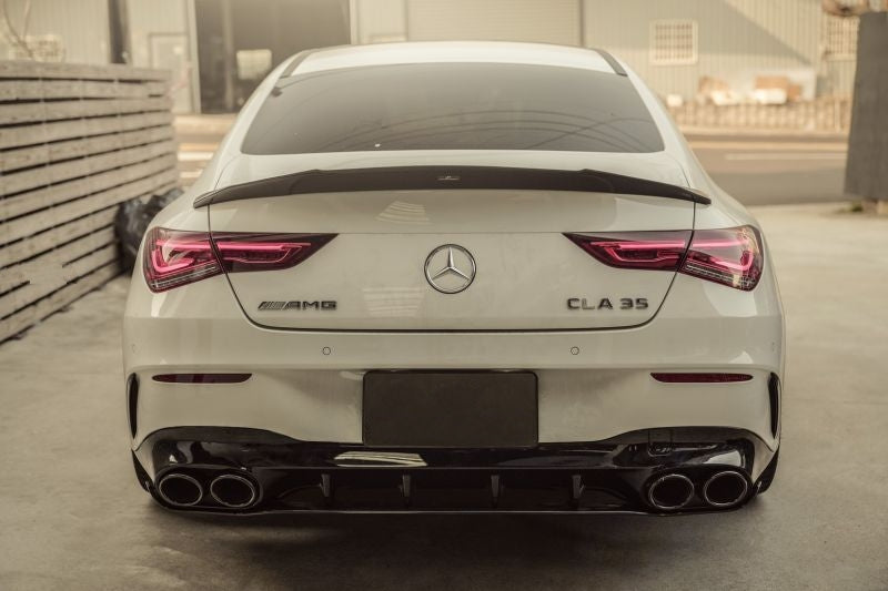 Mercedes Benz CLA-Class/CLA35/CLA45 W118/C118 Future Design Style Gloss Black Rear Bumper Diffuser and Exhaust Tip kit - Manufactured to fit all of the Mercedes CLA-Class Models from the AMG Line to the CLA35 and CLA45. This product transforms the rear end of the CLA Class Mercedes with the High Gloss Black Rear Diffuser with the Quad Exhaust Tip set up that fits directly onto your existing system.