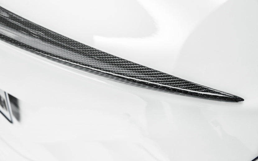 Mercedes Benz CLA-Class/CLA45 AMG Style Carbon Fibre Rear Trunk Spoiler For the W117/C117 Mercedes Models up to 2018 - This product is manufactured from 2*2 Carbon Fibre Weave with FRP to produce a stunning and durable product that fits effortlessly to the trunk of your CLA Class Mercedes. The OEM AMG Styling inspires this product for the CLA Class Models. 