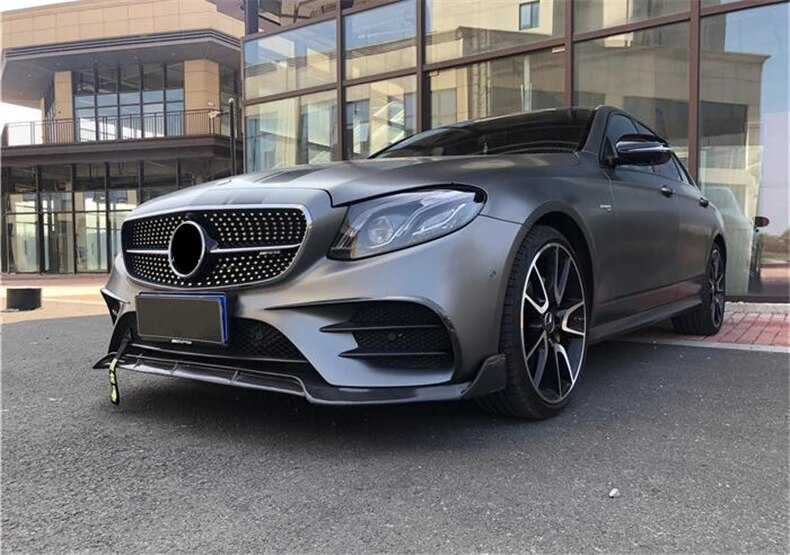  Mercedes (W213) E-Class/E260/E300/E350/E43 BRABUS 800 Inspired Carbon Fibre Body Kit - Taking Inspiration from the most famous car modification company BRABUS. This Kit is designed to make your E Class and E43 Mercedes Model look like the W213 BRABUS 800 Model. Containing the Front Lip, Side Skirts, Rear Diffuser with 3rd Brake Light, Rear Exhaust Tips and Rear Spoiler all styled like the BRABUS Original Parts. 