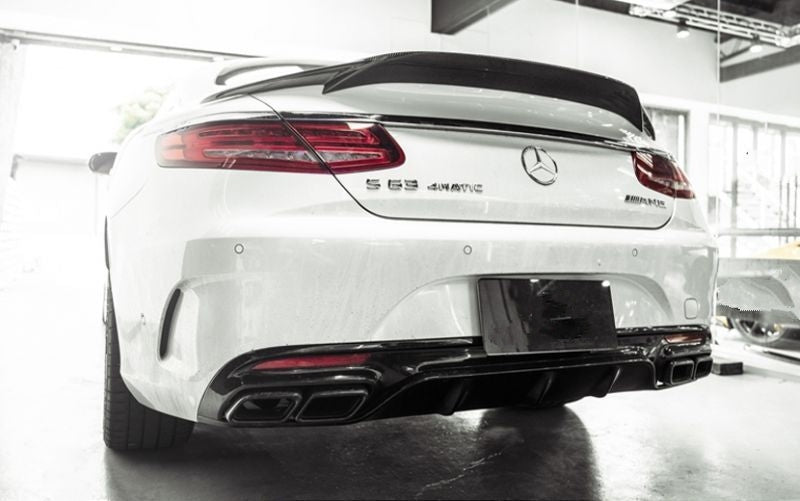 Mercedes Benz S-Class/S63/S65 Coupe (C217) Renntech Style Carbon Fibre Rear Trunk Spoiler - Manufactured from 100% 2*2 Carbon Fibre Weave. This rear spoiler was inspired by Renntech's styling for the S Class Coupe Models, with its customary underside fins and an overhang that almost gives a look that this part melds with the original bodywork of the S-Class Coupe. 