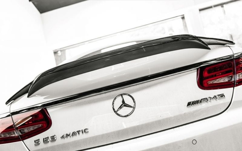 Mercedes Benz S-Class/S63/S65 Coupe (C217) Renntech Style Carbon Fibre Rear Trunk Spoiler - Manufactured from 100% 2*2 Carbon Fibre Weave. This rear spoiler was inspired by Renntech's styling for the S Class Coupe Models, with its customary underside fins and an overhang that almost gives a look that this part melds with the original bodywork of the S-Class Coupe. 