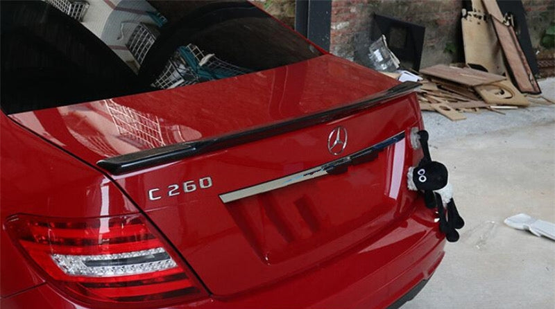 Mercedes Benz C-Class/C63 (W204) Renntech Inspired Carbon Fibre Rear Trunk Spoiler - Designed from the Original Renntech Styling to be a perfect addition to your C-Class or C63 Saloon Mercedes. This product offers a unique shaping with the extended centre portion providing additional downforce as well as aesthetics. Manufactured from 2*2 Carbon Fibre Weave with FRP and finished with a UV Resistant Resin Coating. 