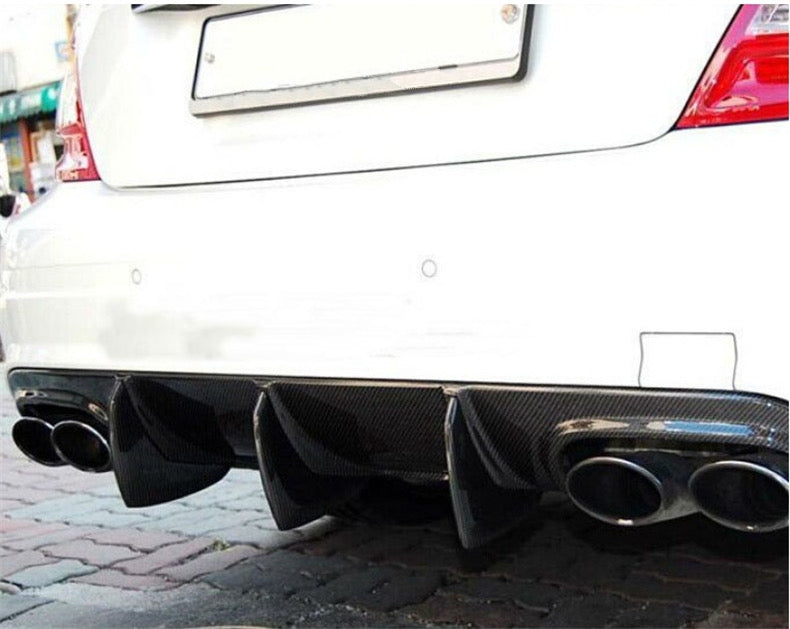 Mercedes Benz C-Class/C63 (C204/W204) Saloon and Coupe Big Fin Style Carbon Fibre Rear Diffuser - inspired by the original C63 diffuser and modified with additional larger fins which screw onto the diffuser from the backside to produce a more aggressive look on your C63 Coupe or Saloon Model. This product is manufactured from 2*2 Carbon Fibre with FRP, giving this product strength and durability on the road. 