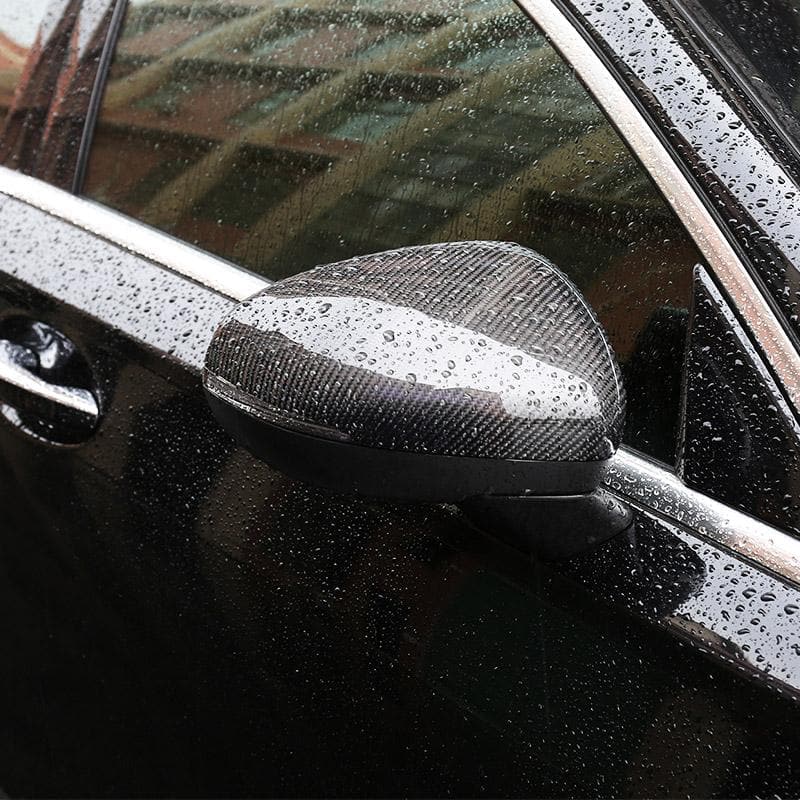 Mercedes A-Class/A35/A45 (W177) Replacement Carbon Fibre Mirror Covers - Inspired by the AMG Look on the A-Class Mercedes and Manufactured from ABS and 2*2 Carbon Fibre Weave to produce a perfect fitment for your A-Class/A35/A45 Model. With these mirror covers, you'll add a unique textured look to your A-Class Model and give it a unique presence. 