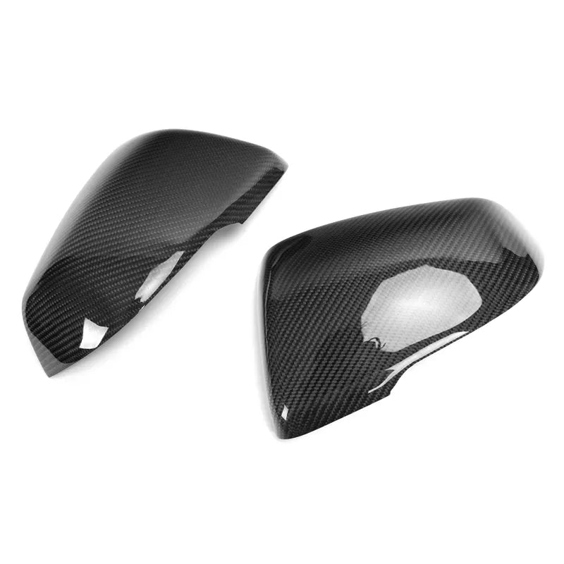 BMW 1 Series (F40) OEM Style Replacement Carbon Fibre Mirror Covers - Manufactured from real carbon fibre with an abs plastic base to ensure an OEM fit every time. This product replaces the existing body-coloured or silver mirror covers that the F40 1 Series BMW comes with for an OEM M Performance Upgrade.