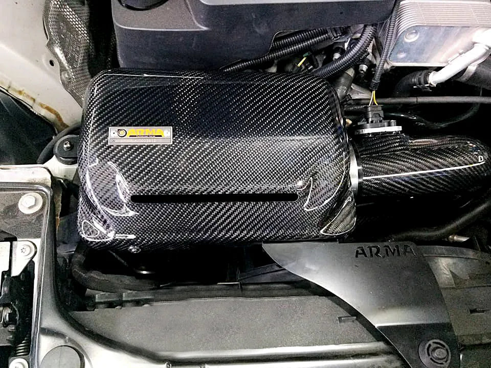 BMW 3 Series N20 Carbon Fibre Intake with Air Filter, Manufactured by ARMASPEED. Carbon Fibre Intake is Designed to perfectly fit the N20 328I Engine Models in the 3 Series F3X Shape. This Carbon Fibre Intake Kit is the perfect addition to increase flow and performance in your N20 3 Series 328I Models. 