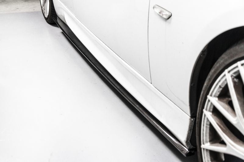 BMW E9X 3 Series M Performance Style Carbon Fibre Side Skirt Extensions - Manufactured to fit the E90 Saloon, E91 Estate, E92 Coupe and E93 Convertible Models. This product is attached with either fixing screws or bonds to create a stunning addition to the side of your M Sport Model BMW. You are enhancing the side view while providing aerodynamic downforce. 