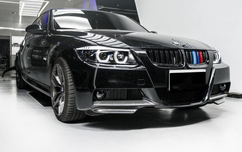 BMW E90/E91 M Performance Style Carbon Fibre Front Bumper Splitters - Manufactured to fit either the Pre-LCI or LCI Models. this product adds an additional layer to the front bumper of the E90 and E91 M Sport BMW 3 Series Models with the addition of longer carbon front splitters to emphasise the front bumpers' features. 