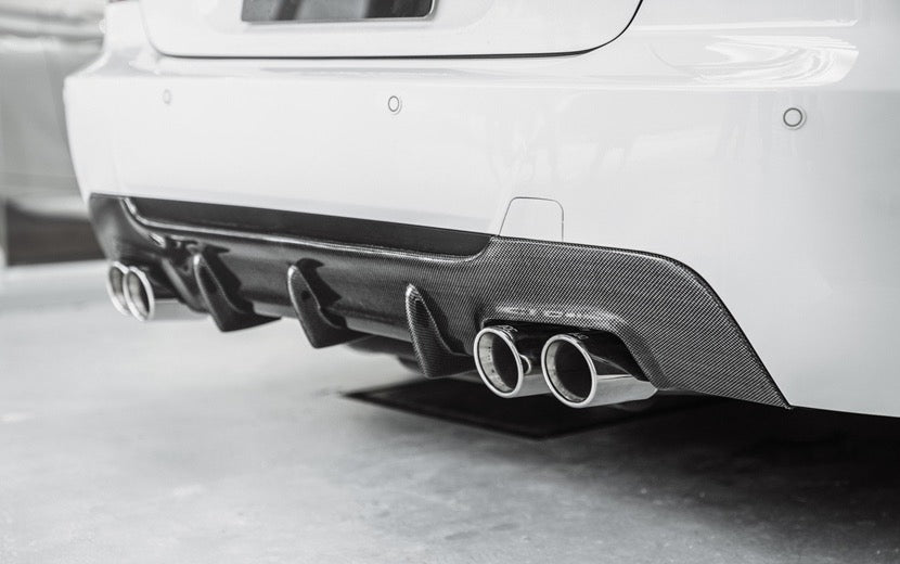 BMW 3 Series (E92/E93) M Performance Style Carbon Fibre Rear Diffuser Quad Pipe Version - Manufactured from 2*2 Carbon Fibre Weave, this BMW M Performance Diffuser for the 3 Series E92 Coupe and E92 Convertible Models fits models looking to enhance their look with a Quad/4 Pipe set up. 