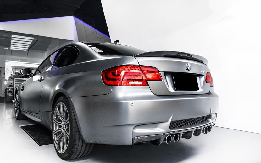 The M Performance Style Rear Spoiler Compatible with 2005-2013 BMW E92 3 Series Coupe & E92 M3 Coupe. It is made of carbon fibre material with a stylish design. The new spoiler works fine and improves overall performance in handling and durability.