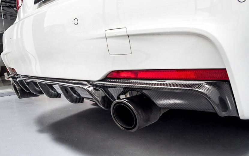 BMW 3 Series F30 Saloon and F31 Estate M Performance Carbon Fibre Rear Diffuser for the 335I/340I Models - Manufactured in the BMW M Performance Styling with 2*2 Carbon Fibre Weave, This product is the perfect replacement diffuser to enhance the rear of your BMW 3 Series Model. With Stunning Shapes and more aggressive shaping, this product suits the nature of the BMW 335I and 340I models. 