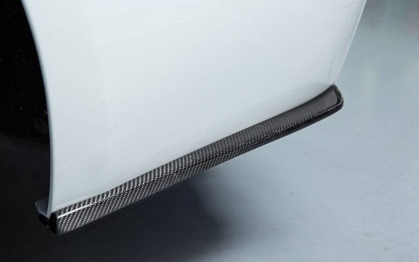 BMW 3 Series (F30/F31) Future Design Style Carbon Fibre Rear Lower Bumper Canards - Manufactured from 2*2 Carbon Fibre weave and FRP to be robust and durable. These lower rear bumper canards sit on the underside of the rear bumper and fit perfectly to the M Sport F30 Saloon 3 Series and F31 Estate 3 Series Models. Providing a side skirt extension to the rear bumper.