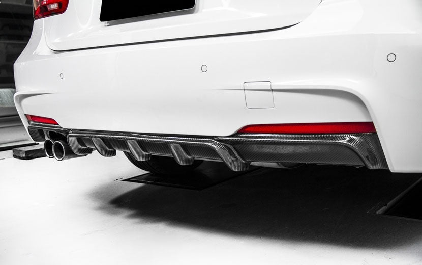 The BMW F30/F31 Saloon/Estate 3 Series Twin Exhaust Rear Diffuser is Made of carbon fibre material Composite with FRP for the best fitment possible.  Its Racing inspired aerodynamics and styling fit BMW 3 series F30 sport edition 320i 325i 328i 335i M sport M-tech. M Tech Single Rear Diffuser is Super lightweight and Durable. It is UV-Protective Clear Coated or Fade & Rust Resistant.
