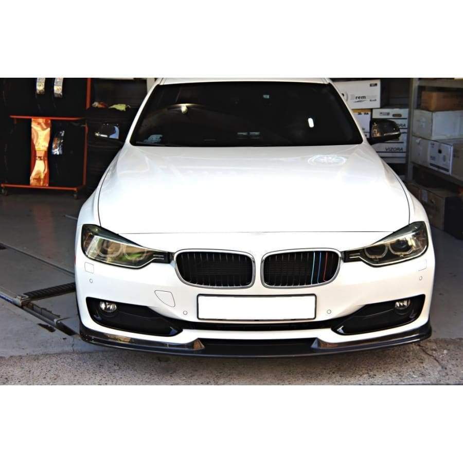 BMW F30/F31/F35 3 Series SE Carbon Fibre Front Lip Spoiler - Manufactured for the Non-M Sport BMW 3 Series Models between 2012 - 2015 This product adds an M Sport look without the expense of purchasing a new front bumper. This product is aerodynamic in its design and allows the car to have more downforce when cornering and at higher speeds. This front lip spoiler is manufactured from 2*2 Carbon Fibre Weave with FRP