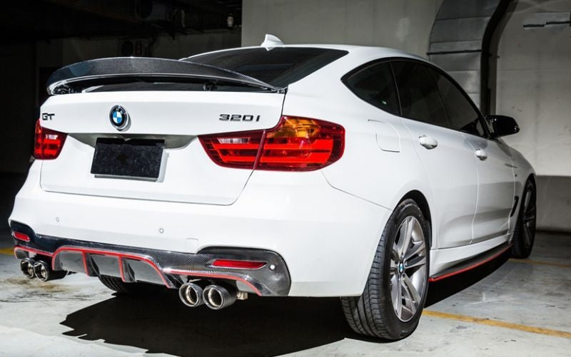 BMW 3 Series GT F34 Quad Pipe Rear Diffuser - Manufactured from 2*2 Carbon Fibre Weave with FRP, producing a perfect fitment to the M Sport F34 Rear Bumper and perfect for the Quad Exhaust setup. This product enhances the rear styling of the F34 3 Series GT Models with a more aggressive presence than the 335I Twin Pipe Verison. 