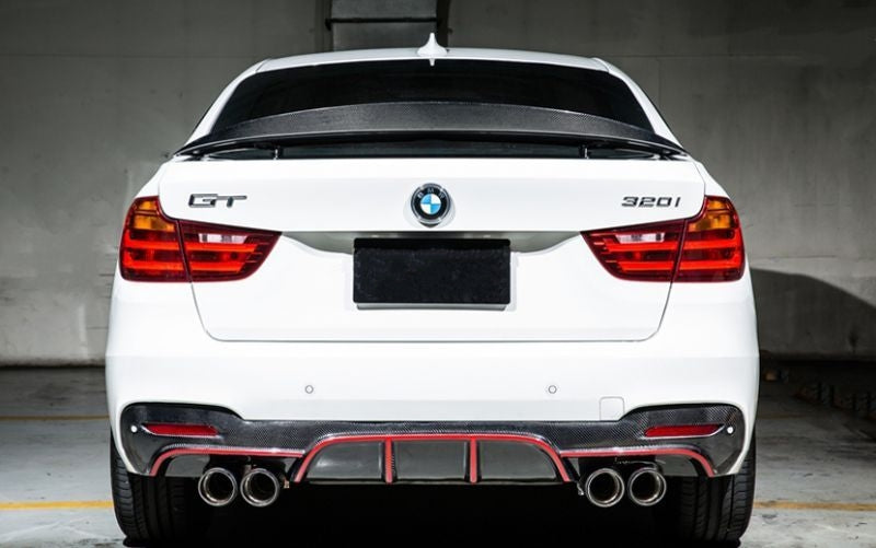 BMW 3 Series GT F34 Quad Pipe Rear Diffuser - Manufactured from 2*2 Carbon Fibre Weave with FRP, producing a perfect fitment to the M Sport F34 Rear Bumper and perfect for the Quad Exhaust setup. This product enhances the rear styling of the F34 3 Series GT Models with a more aggressive presence than the 335I Twin Pipe Verison. 