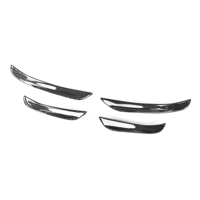 BMW G20/G21/G28 TK Style Carbon Fibre Front Bumper canards - This 4 Piece design front bumper canard set will make your G20 3 Series M Sport stand apart from the rest with its stunning curves and design. You can be sure that this magnificent piece of equipment will outperform your expectations. 
