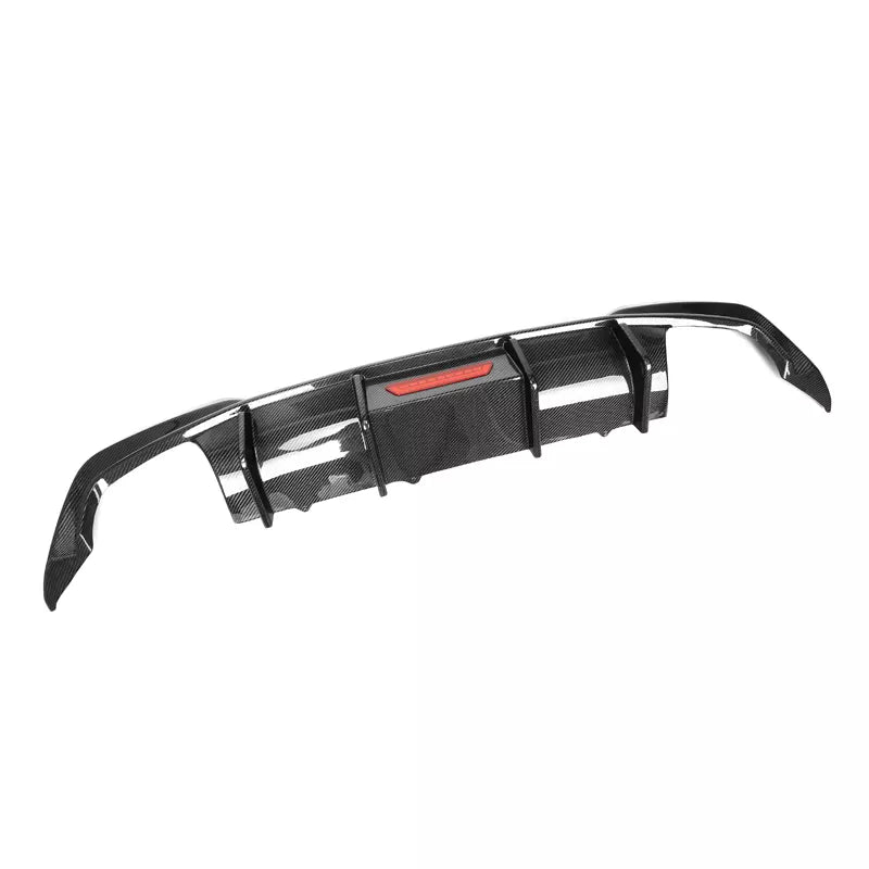 Upgrade the look and performance of your BMW 3 Series with this TKAD style carbon fibre rear diffuser. Designed to fit the 2019+ BMW 3 Series 4-door saloon (G20) and 4-door estate/wagon (G21) models, this high-quality aftermarket accessory is made from durable and lightweight carbon fibre. It enhances the appearance of your vehicle while also improving its aerodynamics. The centre LED 3rd brake light adds an extra level of visibility and safety. Professional installation required.