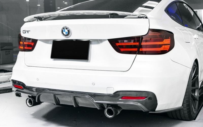 BMW 3 Series F34 Gran Turismo M Performance Style Carbon Fibre Rear Diffuser for the Twin Exit Exhaust System found on the 335I Models. This product is styled from the M Performance Design and is a perfect fit for the GT Series BMW M Sport Models. Manufactured from 2*2 Carbon Fibre Weave and FRP and Coated in a UV Resistant Coating to prevent yellowing and deterioration.
