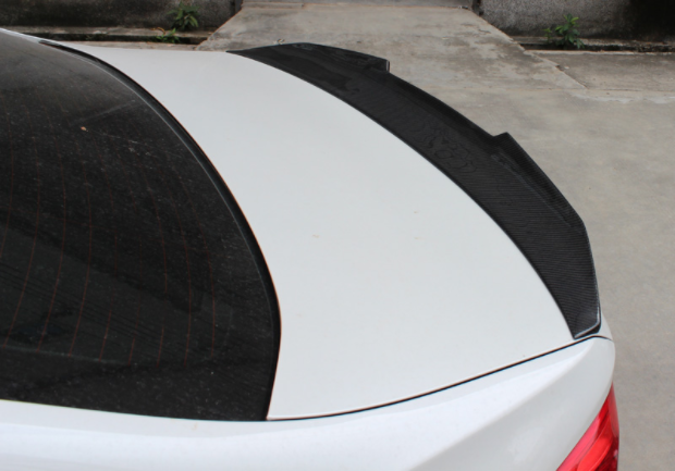BMW 3 Series and M3 Coupe (E92) Convertible (E93) PSM Style Carbon Fibre Rear Lip Spoiler - Styled in the PSM Styling for the E92 and E93 BMW 3 Series and M3 Models, this product adds a more aggressive look to your rear end with its upswept design and centre cutouts which are the signature look for the PSM spoilers.