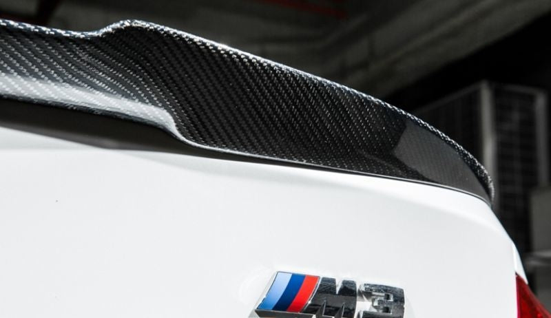 BMW F30/F80 M3 M4 Style Carbon Fibre Rear Spoiler made of high-quality 2*2 3K Carbon Fibre material enhances the exterior appearance of the vehicle's bumper and gives it a nice sporty look. This Rear Spoiler dramatically enhances style and appearance. It also Increases Aerodynamics.