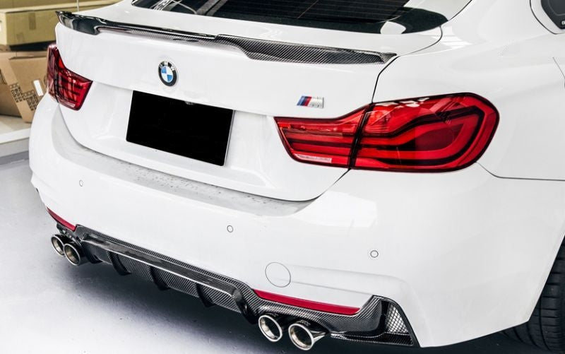 BMW F32/F33/F36 M Performance Style Carbon Fibre Rear diffuser for the Quad Exhaust System - Designed from the original 435I/440I M Performance Diffuser and modified to accommodate the quad exhaust system, this diffuser gives your 4 series a completely new look that is not found on any stock models. 